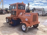 Used Broce Broom Sweeper in yard